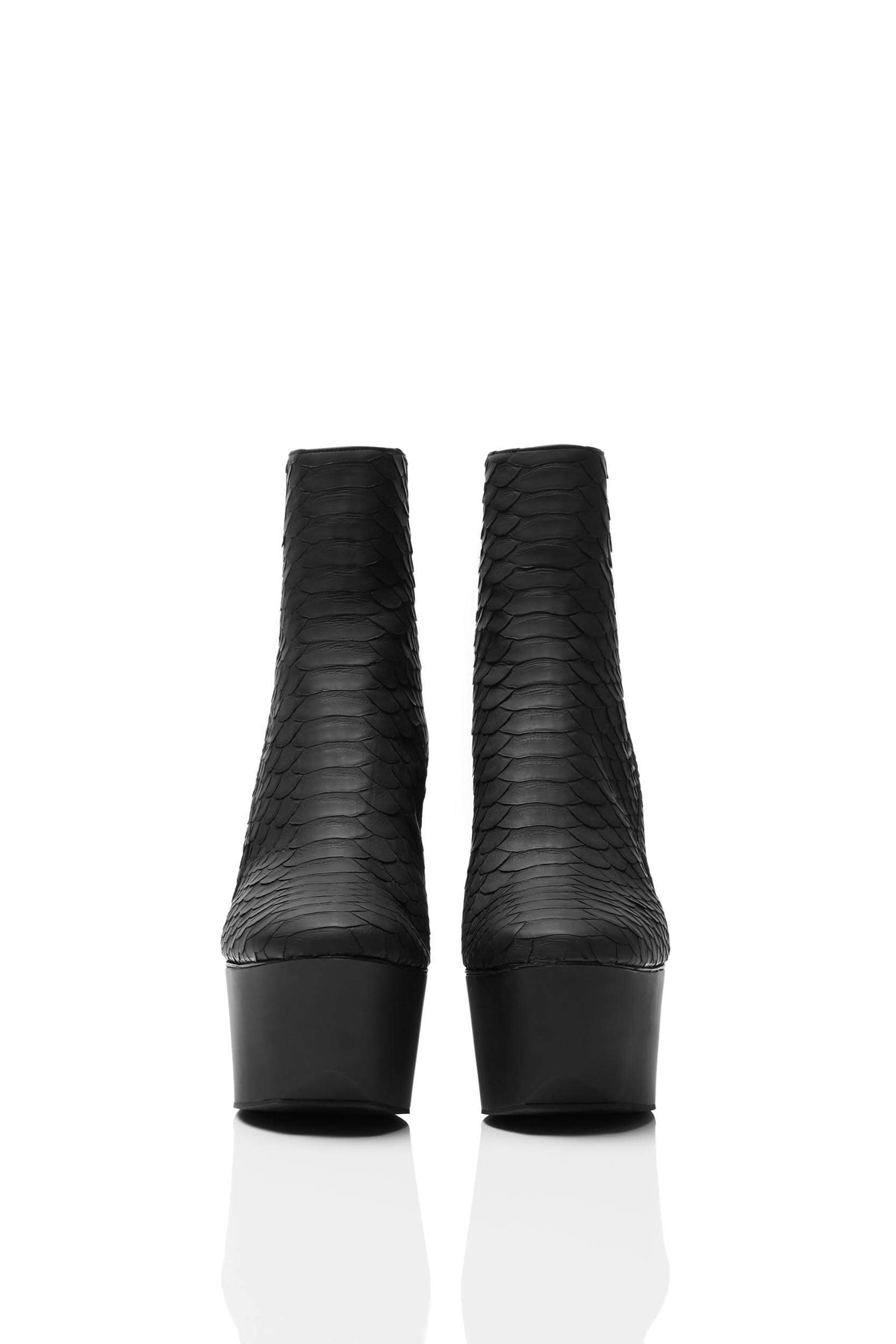 HAIKI 651 – Back zip platform boot with softly rounded toe. Finished in coated Genuine Python in black. 
