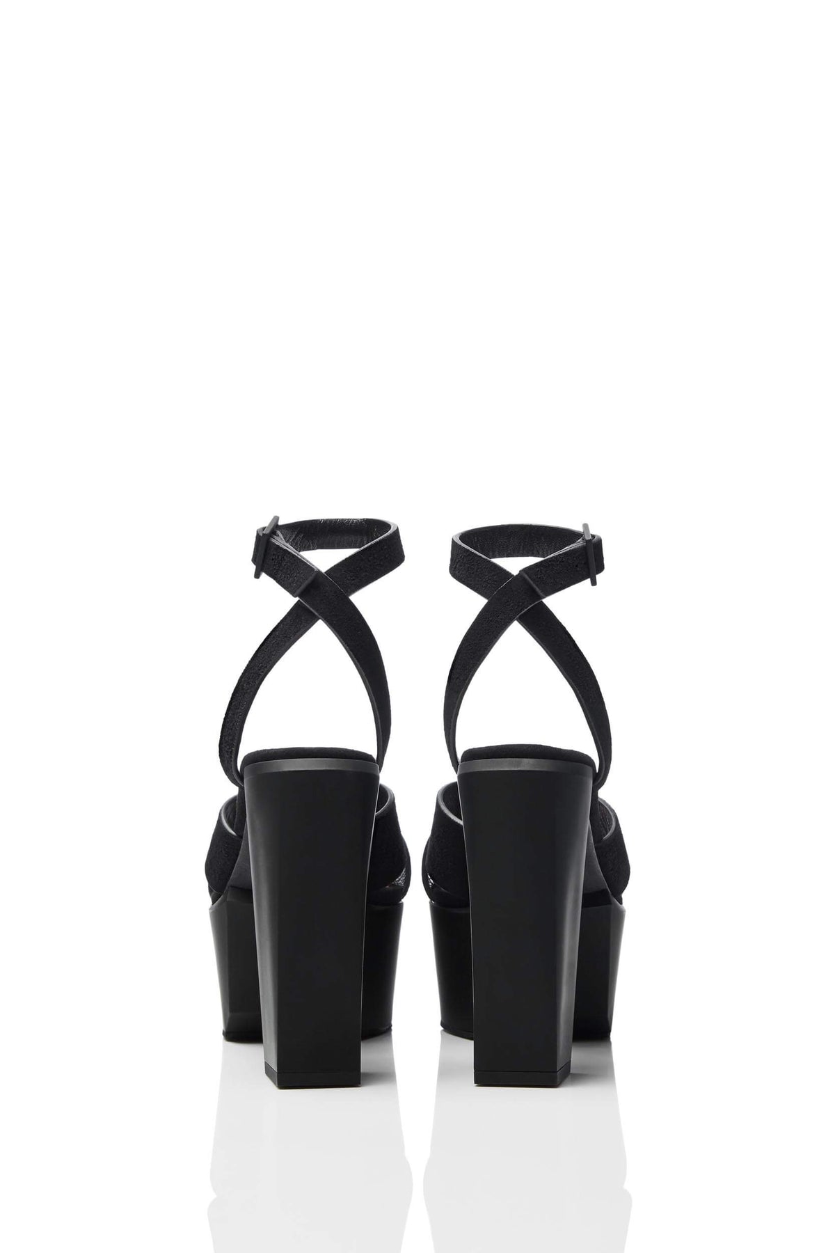 HAIKI 601 - Wide band, crisscross sandal, with self-adjusting ankle strap. Soft Kidsuede with hand-coated edges in black. 